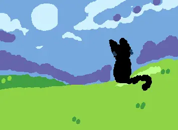 kitty looking out the vast grass
